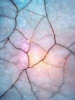Cracked marble texture with glowing cracks photo