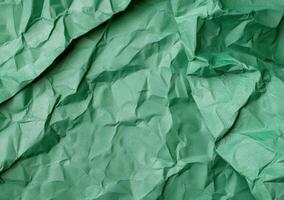 crumpled green tissue paper background photo