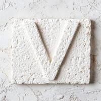 Crumpled piece of white paper on a textured background photo