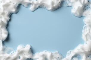 soapy bubbles on a light blue background photo