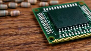 close up of a computer circuit board on a wooden table photo