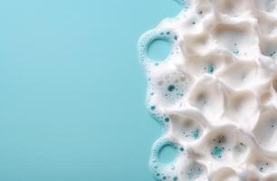 Soapy bubbles on a turquoise background photo