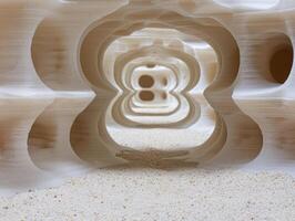 Surreal sandstone cave formation with number 8 symbol photo