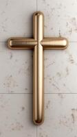 Golden cross on marble background photo