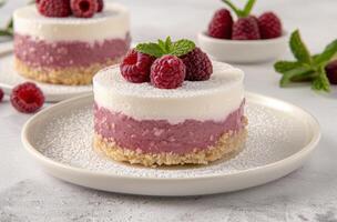 delicious raspberry mousse cake with fresh raspberries photo