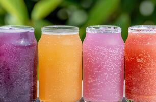 Assortment of colorful refreshing fruit drinks photo