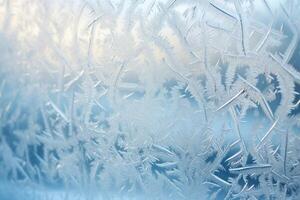 Intricate frost patterns on a cold winter window photo