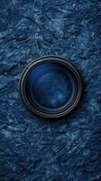Close up of a camera lens on a dark textured background photo