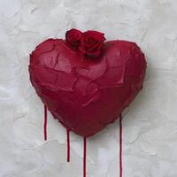 red rose heart on textured background photo