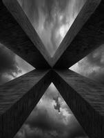 dramatic architectural abstract with moody clouds photo