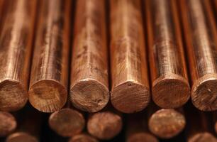 Close up of stacked wooden logs photo