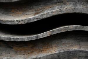 Textured rock layers in a dark cave photo