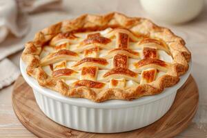 Freshly baked apple pie with a golden crust photo