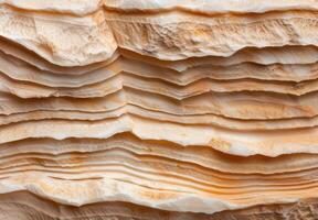 Detailed texture of natural sandstone rock layers photo