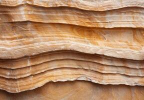 Layered sandstone rock formation texture photo