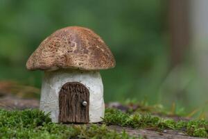 Whimsical mushroom house in the forest photo