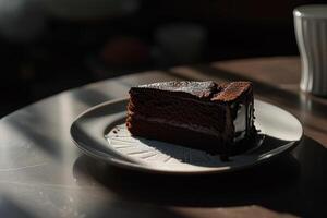 Delicious chocolate cake slice on plate photo
