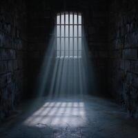 Dramatic light shining through prison cell window photo