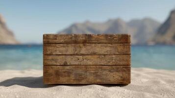 Wooden crate on sandy beach with mountains in background photo