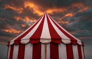 Dramatic circus tent against stormy sky photo