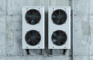 modern air conditioning units on concrete wall photo