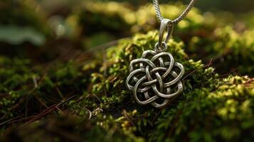 Intricate celtic knot pendant in nature photo