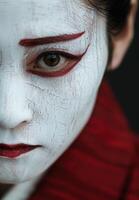 Intense close up of a painted face photo