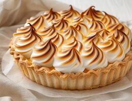Delicious lemon meringue pie with swirled topping photo