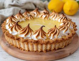Delicious lemon meringue pie with golden peaks of toasted meringue photo
