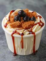 Delicious dessert with honeycomb and chocolate drizzle photo