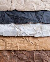 Layers of crumpled paper textures photo