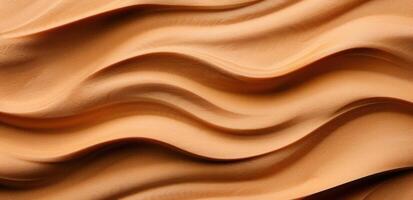 Smooth flowing sand dunes in the desert photo