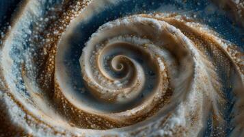 Intricate spiral pattern in frozen ice photo