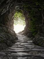 Mysterious forest path through rocky archway photo