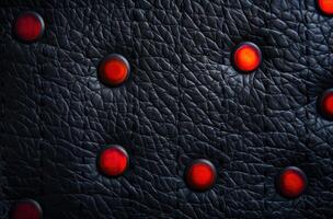 dark textured background with red circular accents photo