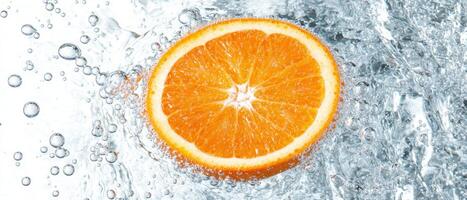 Refreshing orange slice in sparkling water photo