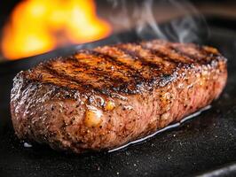 Sizzling steak on a fiery grill photo