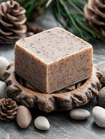 Handmade natural soap bar on rustic wooden surface photo