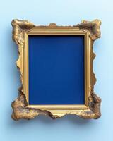 Ornate gold frame with deep blue background photo