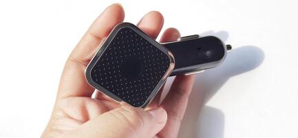 Dual port usb car charger isolated on white background. Fast charger for mobile phone photo