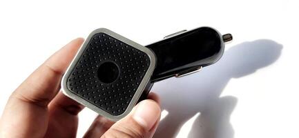 Dual port usb car charger isolated on white background. Fast charger for mobile phone photo