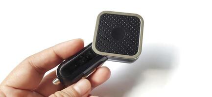 Dual port usb car charger isolated on white background. Fast charger for mobile phone photo
