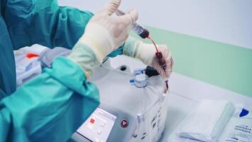 Laboratory research of stem cells. Platelet-Rich plasma preparation. Plasma in syringe. video