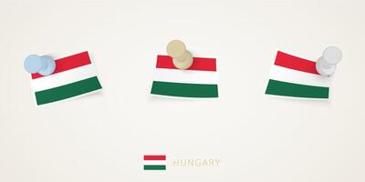 Pinned flag of Hungary in different shapes with twisted corners. pushpins top view. vector