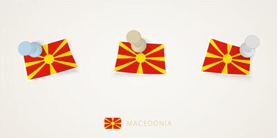 Pinned flag of Macedonia in different shapes with twisted corners. pushpins top view. vector