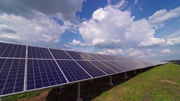 Solar panels on the ground under the sky. Solar system powered by the sun. Clean technology for better future. Photovoltaic panel system. video