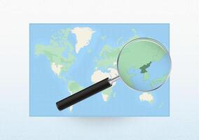 Map of the World with a magnifying glass aimed at North Korea, searching North Korea with loupe. vector