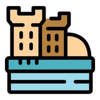 Sandcastle standing on beach by the sea waves vector