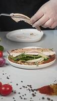 White chicken meat, which is rich in protein, is added to recipe for juicy sandwich. creates delicious and nutritious low-calorie snack that is suitable for healthy diet. video