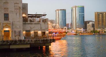 DUBAI, UAE - February 10, 2023. Everyday life in the heart of old Dubai. In the historical district of Deira photo